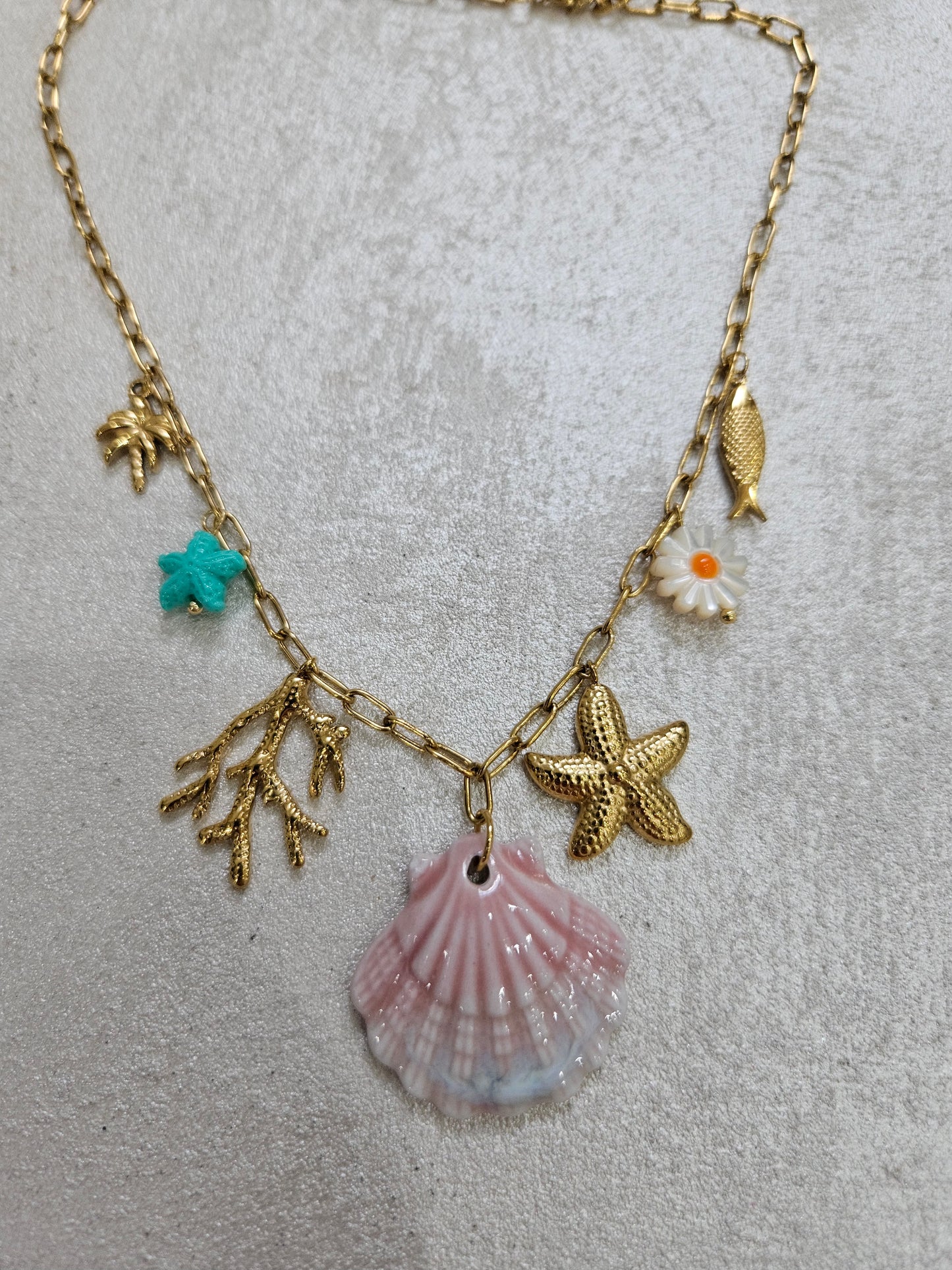 Collana conchiglia e charm in acciaio inox