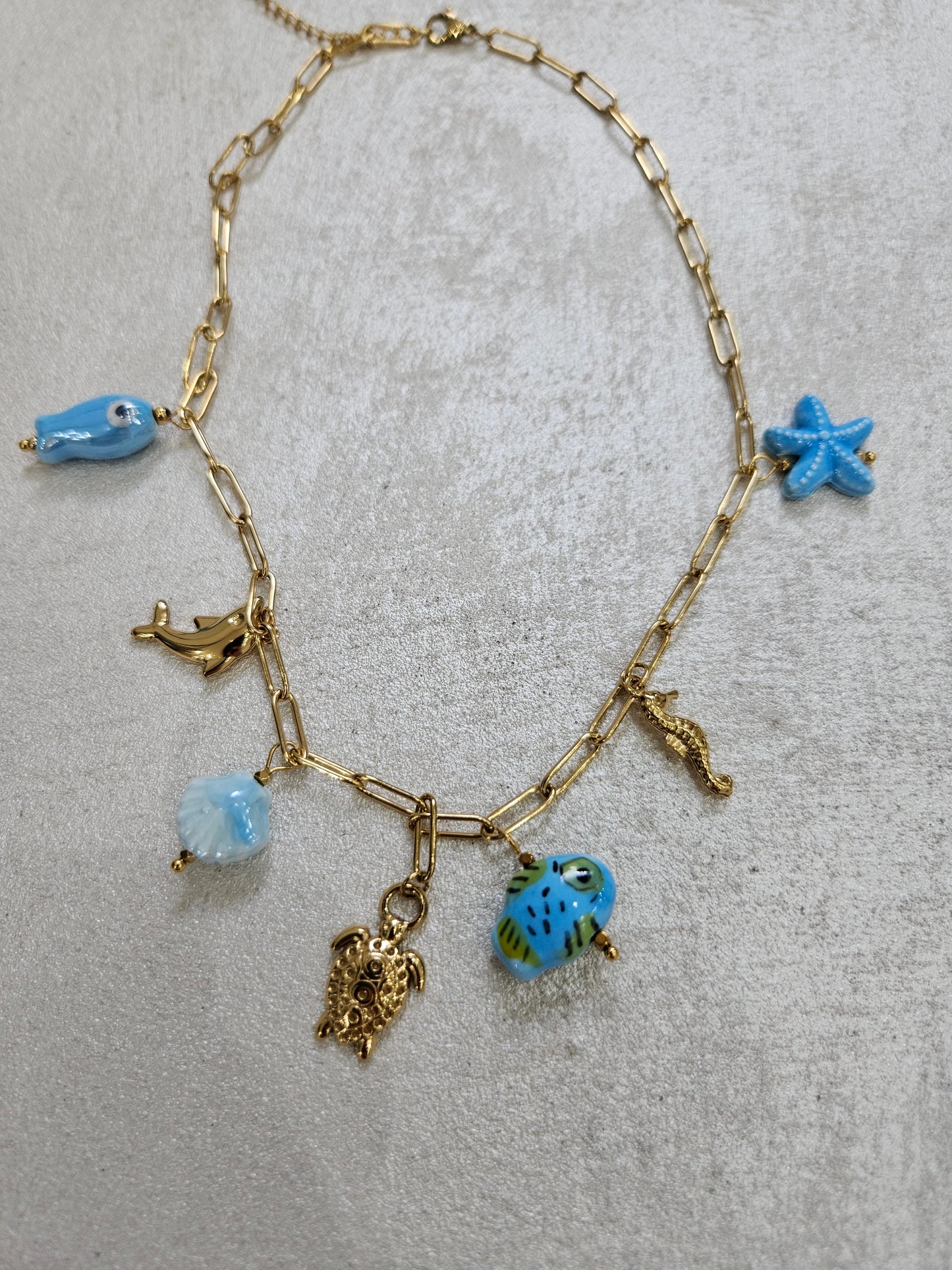 Collana con charm tartaruga in acciaio inox