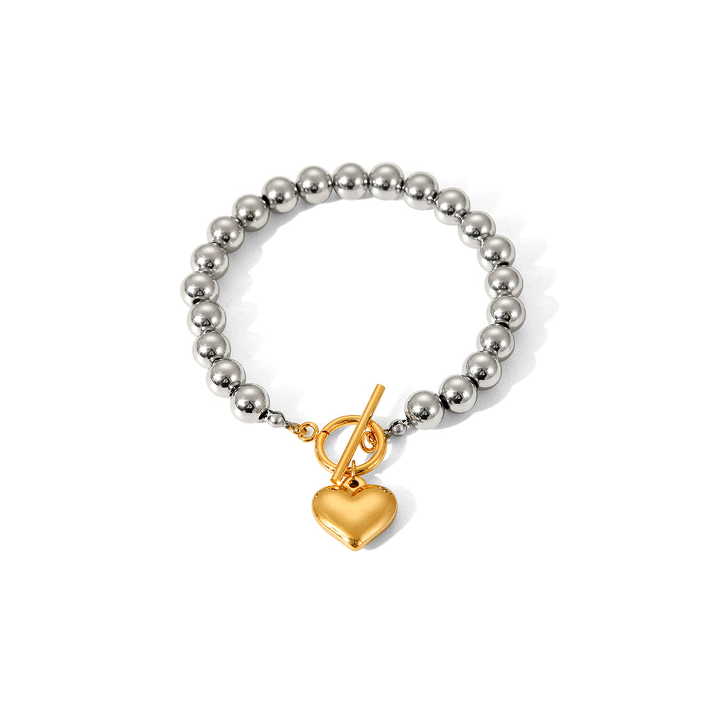 BRACCIALE SFERE LUMINOSE IN ARGENTO CON PENDOLO A CUORE IN ORO ACCIAIO INOX 304 MIS.20,5 CM