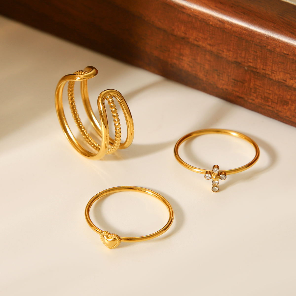 TRIS ANELLI INCROCIO CON  CROCE-CUORE CON ZIRCONI ACCIAIO INOX 304