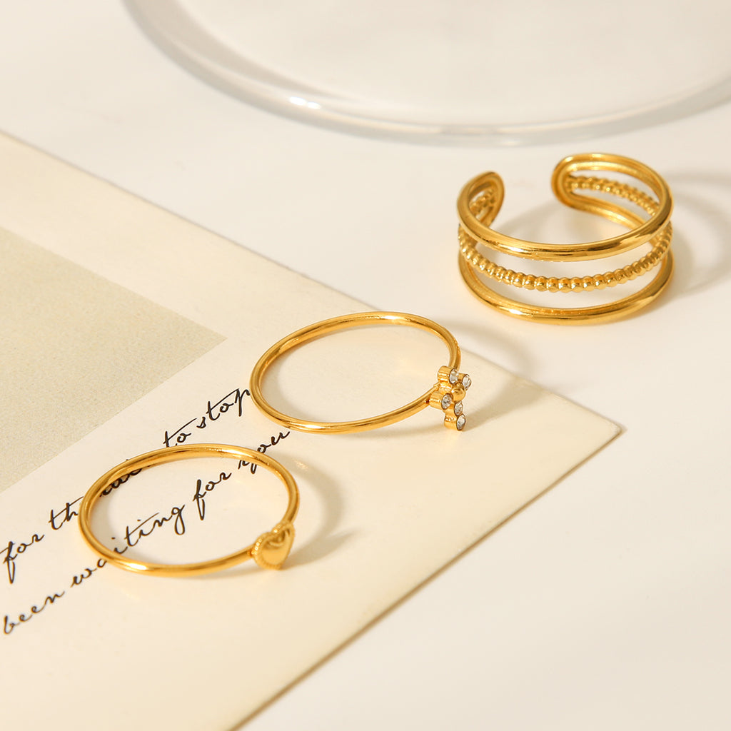 TRIS ANELLI INCROCIO CON  CROCE-CUORE CON ZIRCONI ACCIAIO INOX 304