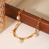 BRACCIALE CONCHIGLIA IN ORO CON PERLE NATURALI ACCIAIO INOX 304 REGOLABILE