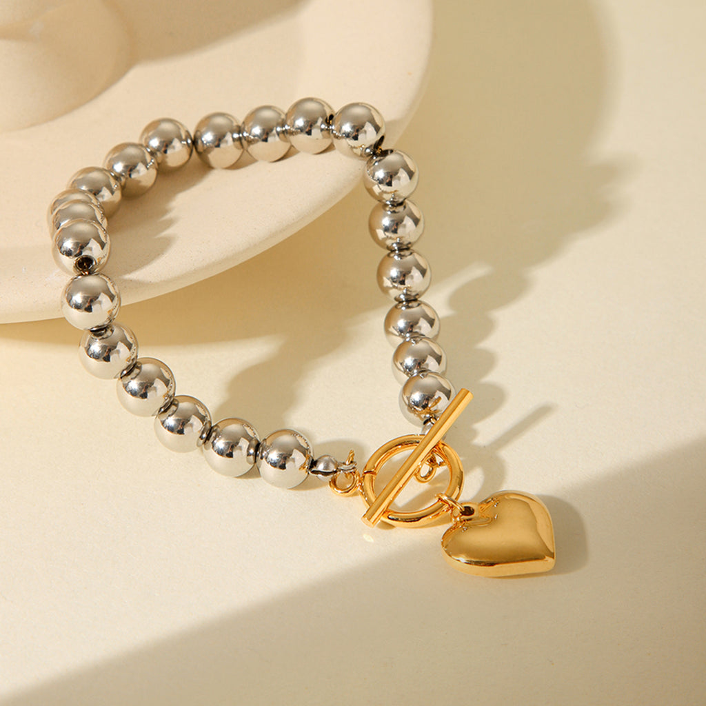 BRACCIALE SFERE LUMINOSE IN ARGENTO CON PENDOLO A CUORE IN ORO ACCIAIO INOX 304 MIS.20,5 CM