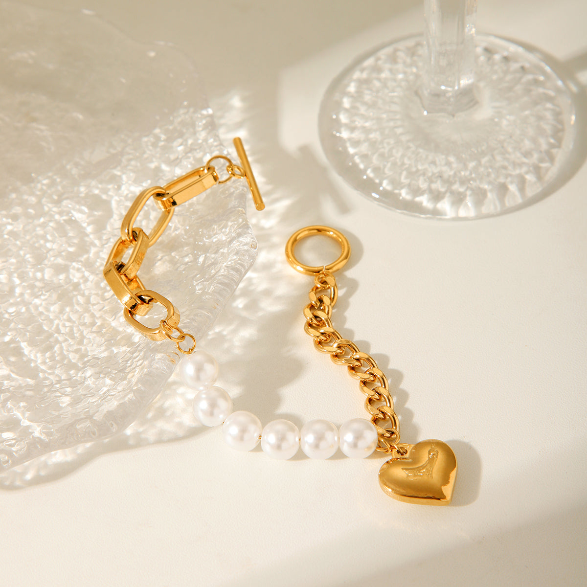 BRACCIALE PERLA CON CIONDOLO A CUORE IN OROR  ACCIAIO INOX 304 MIS.19 CM