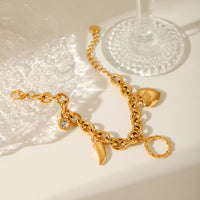 BRACCIALE FANTASY CON CIONDOLI IN OROR ACCIAIO INOX 304 REGOLABILE
