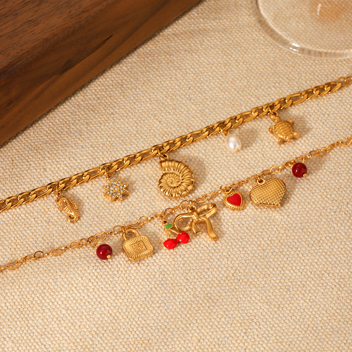 BRACCIALE FIOCCO CON CIONDOLI E PIETRE ACCIAIO INOX 304 REGOLABILE