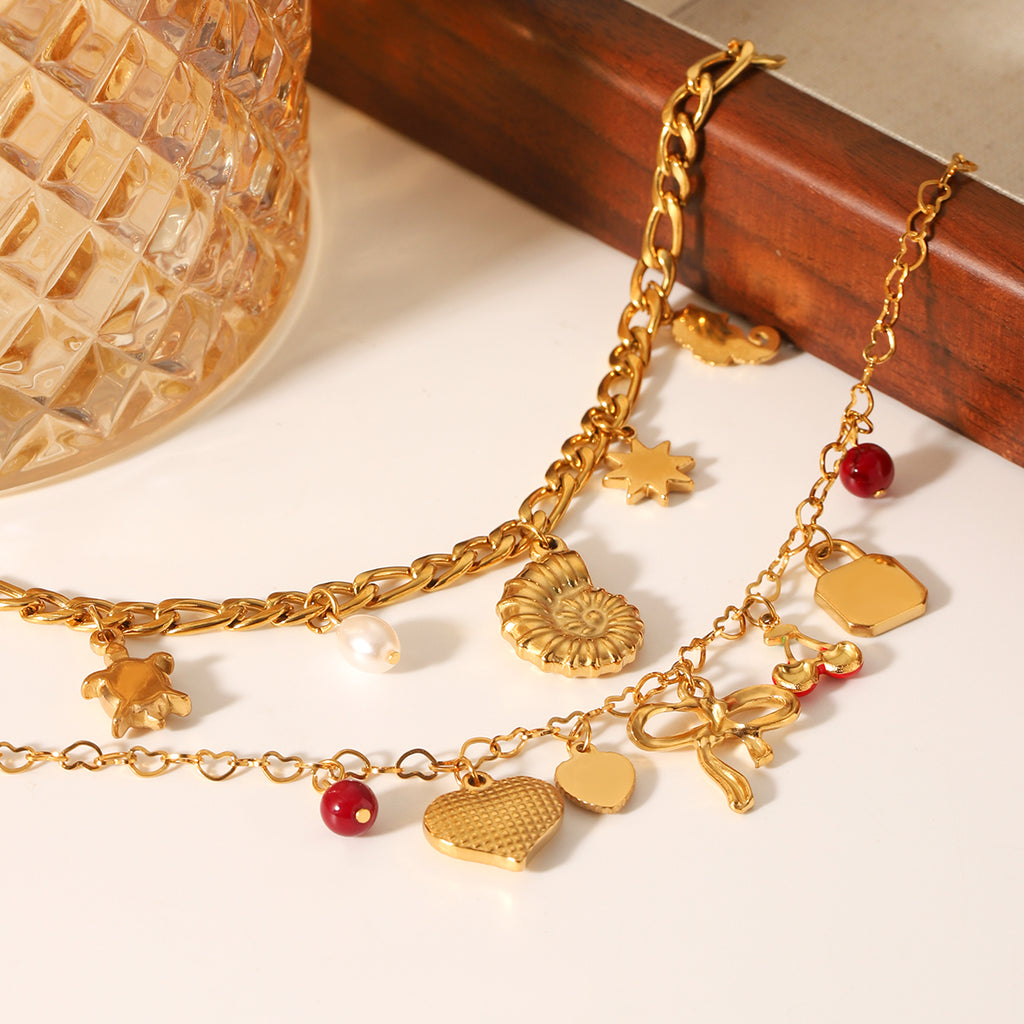 BRACCIALE FIOCCO CON CIONDOLI E PIETRE ACCIAIO INOX 304 REGOLABILE