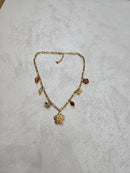 Collana farfalla con charm in acciaio inox