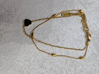 Bracciale doppio filo con charm in acciaio inox