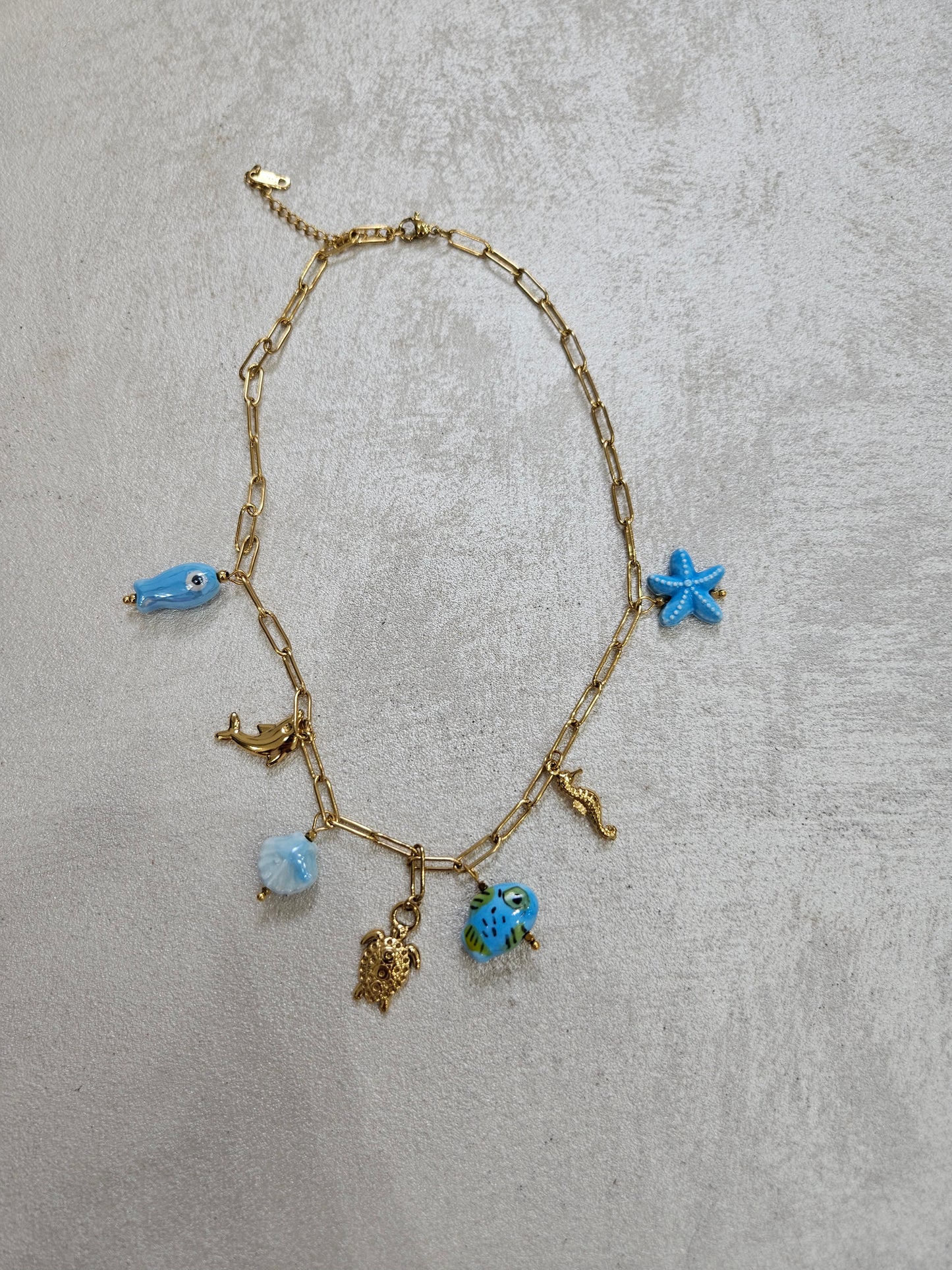 Collana con charm tartaruga in acciaio inox