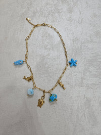Collana con charm tartaruga in acciaio inox