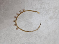 Bracciale con goccie rosa in acciaio inox