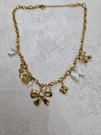 Collana fiocco con charm in acciaio inox
