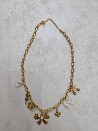 Collana fiocco con charm in acciaio inox