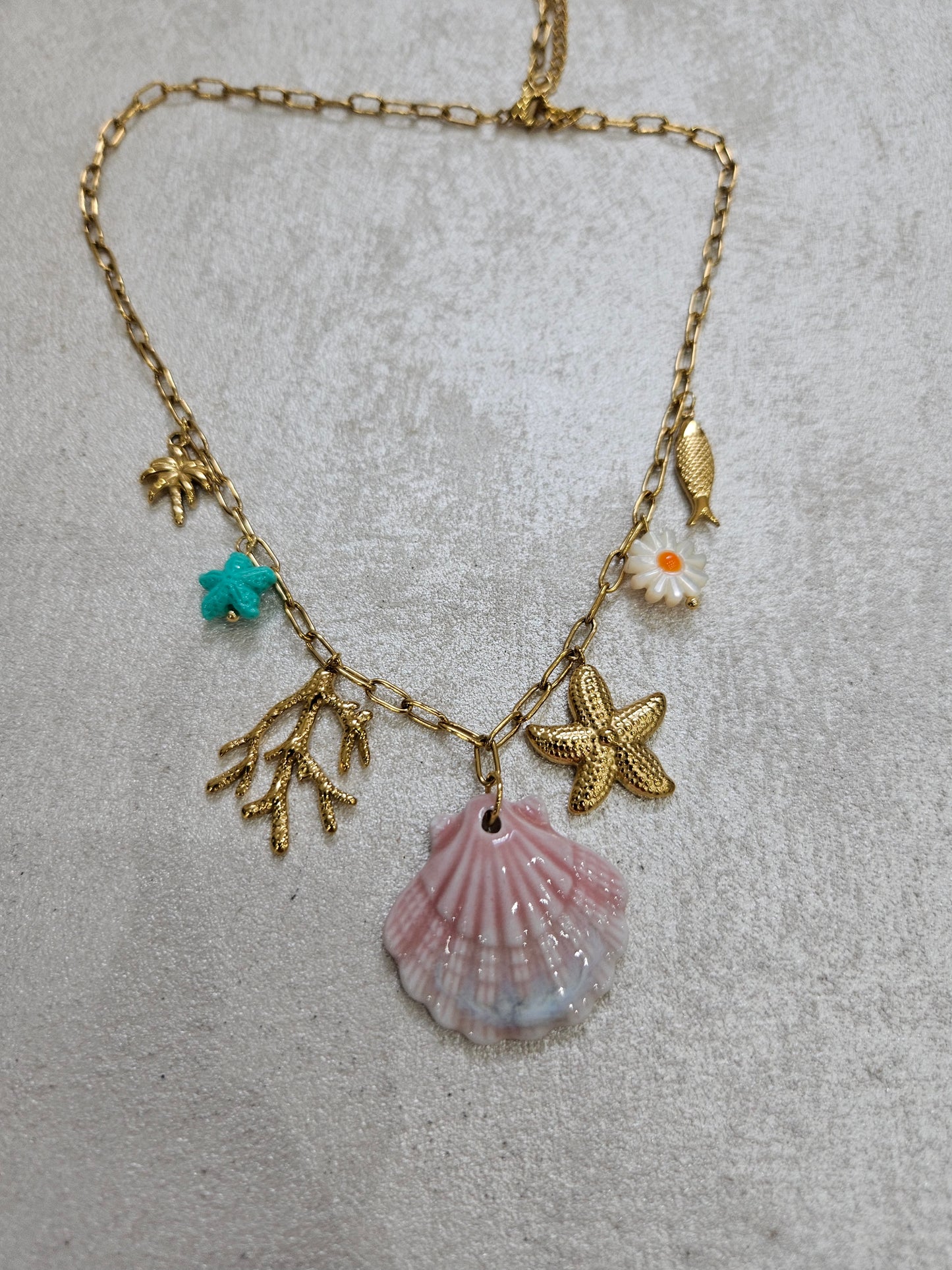 Collana conchiglia e charm in acciaio inox