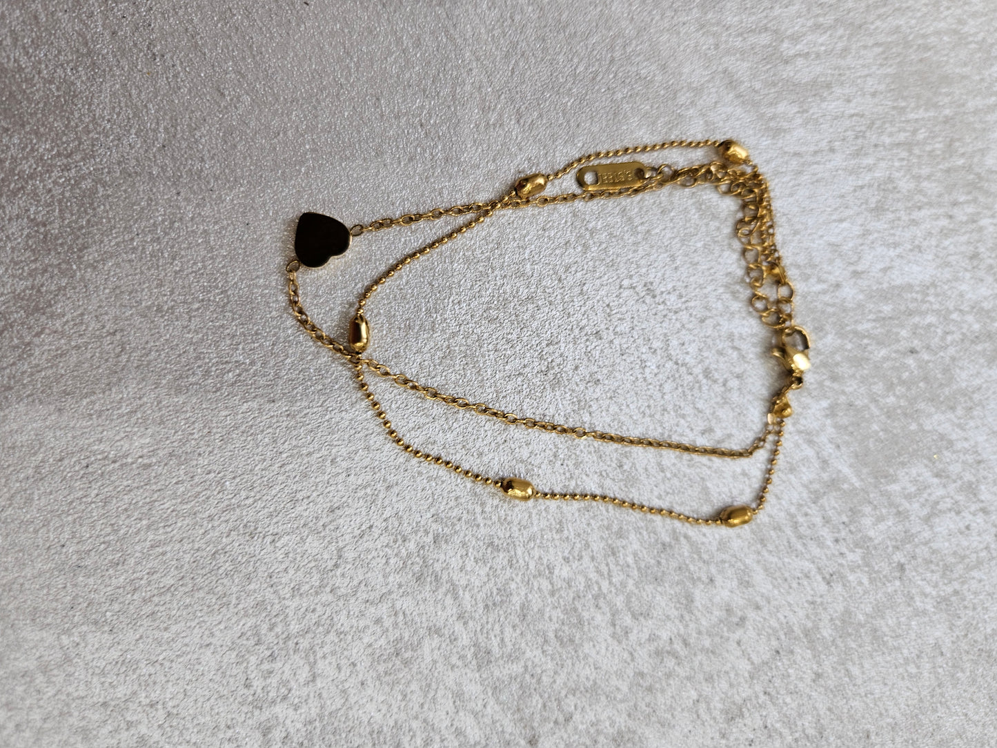 Bracciale doppio filo con charm in acciaio inox