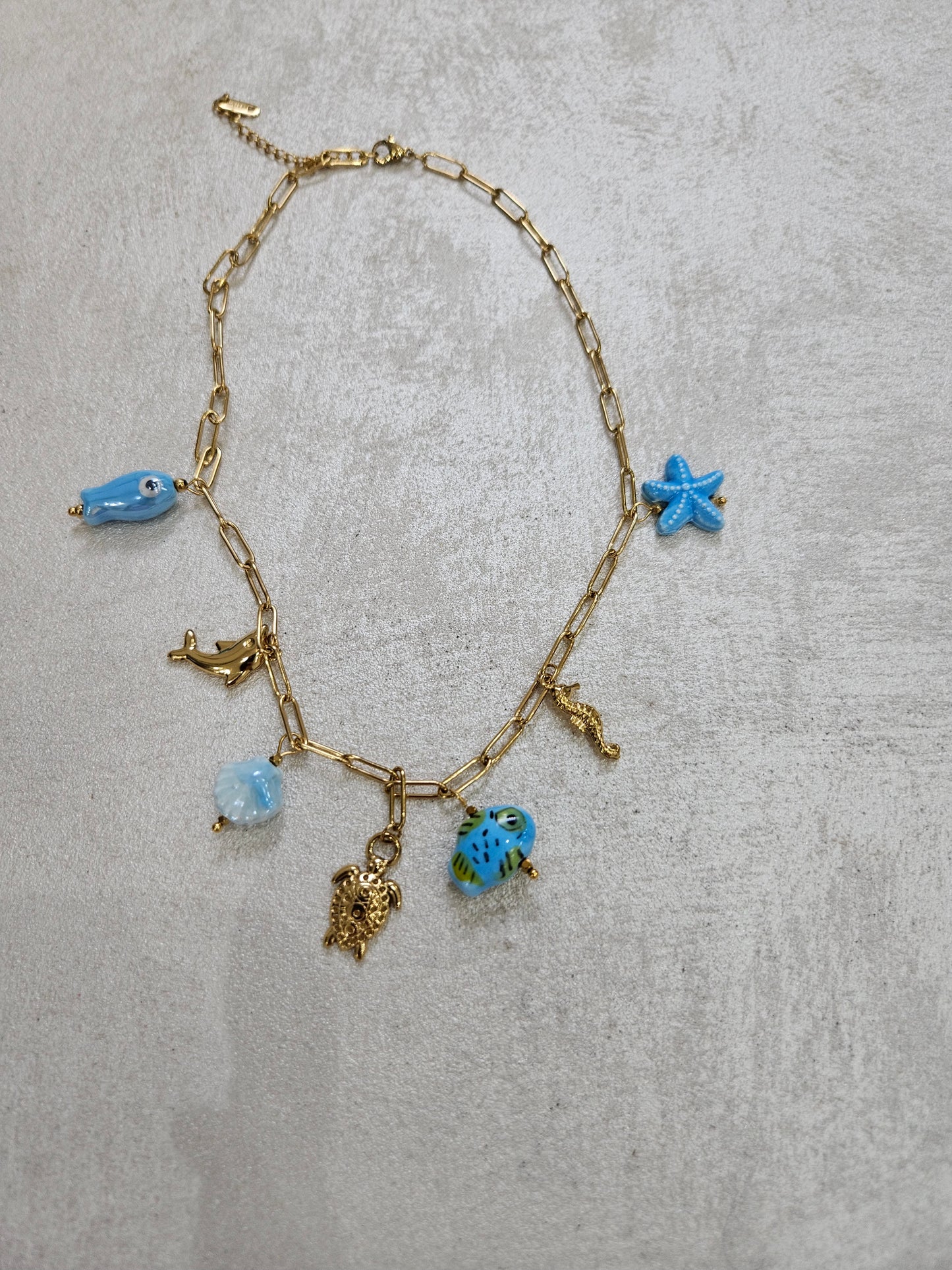 Collana con charm tartaruga in acciaio inox
