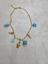 Collana con charm tartaruga in acciaio inox