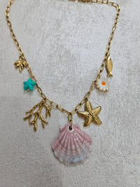 Collana conchiglia e charm in acciaio inox