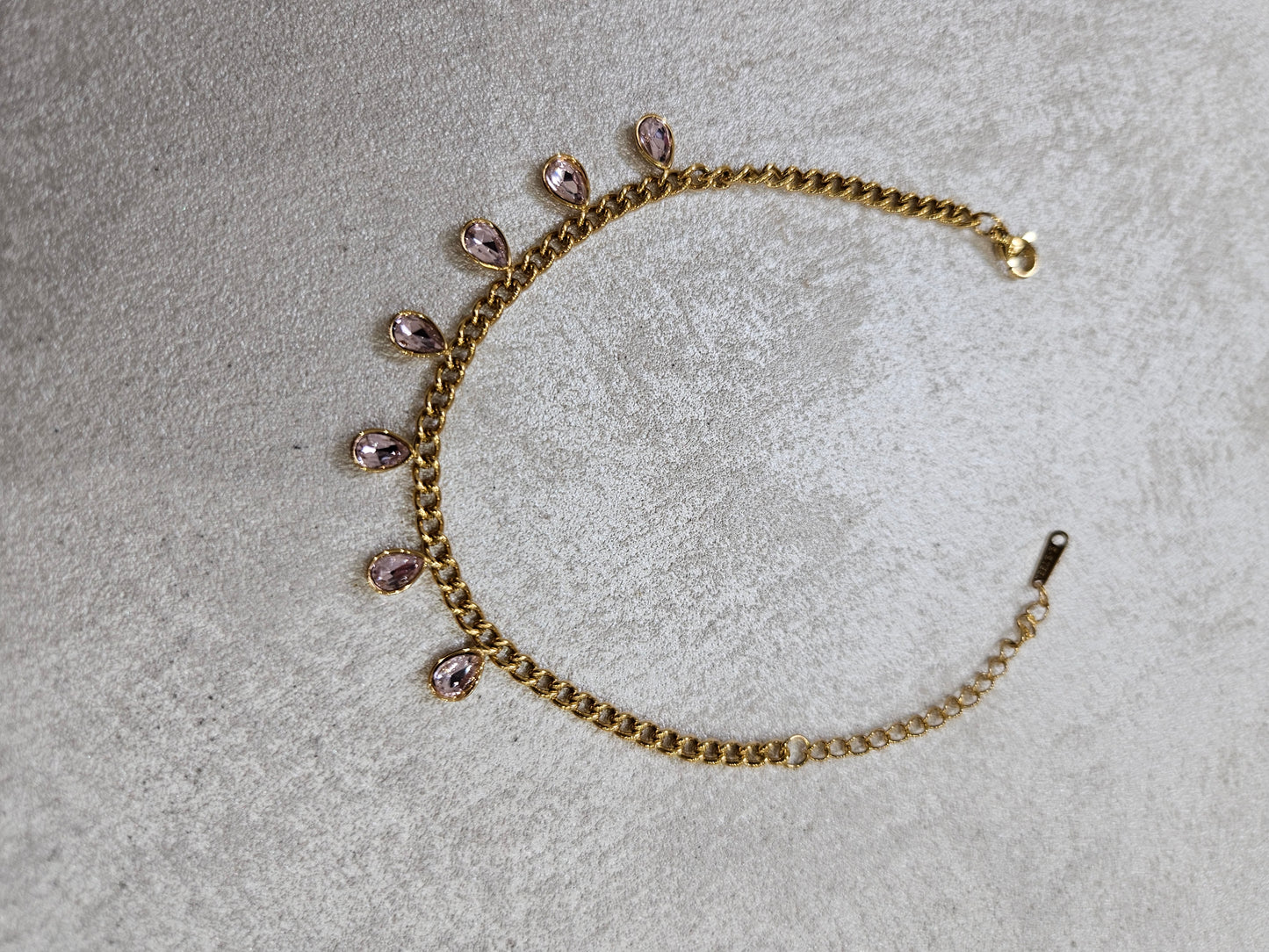 Bracciale con goccie rosa in acciaio inox
