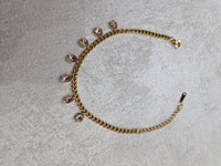 Bracciale con goccie rosa in acciaio inox