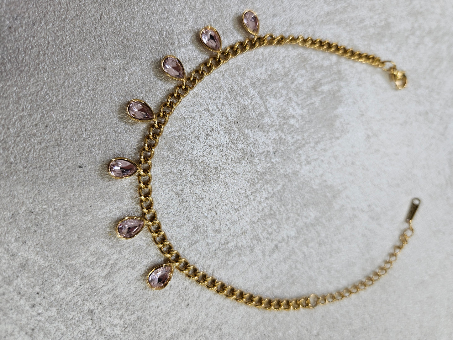 Bracciale con goccie rosa in acciaio inox