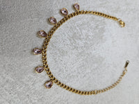 Bracciale con goccie rosa in acciaio inox