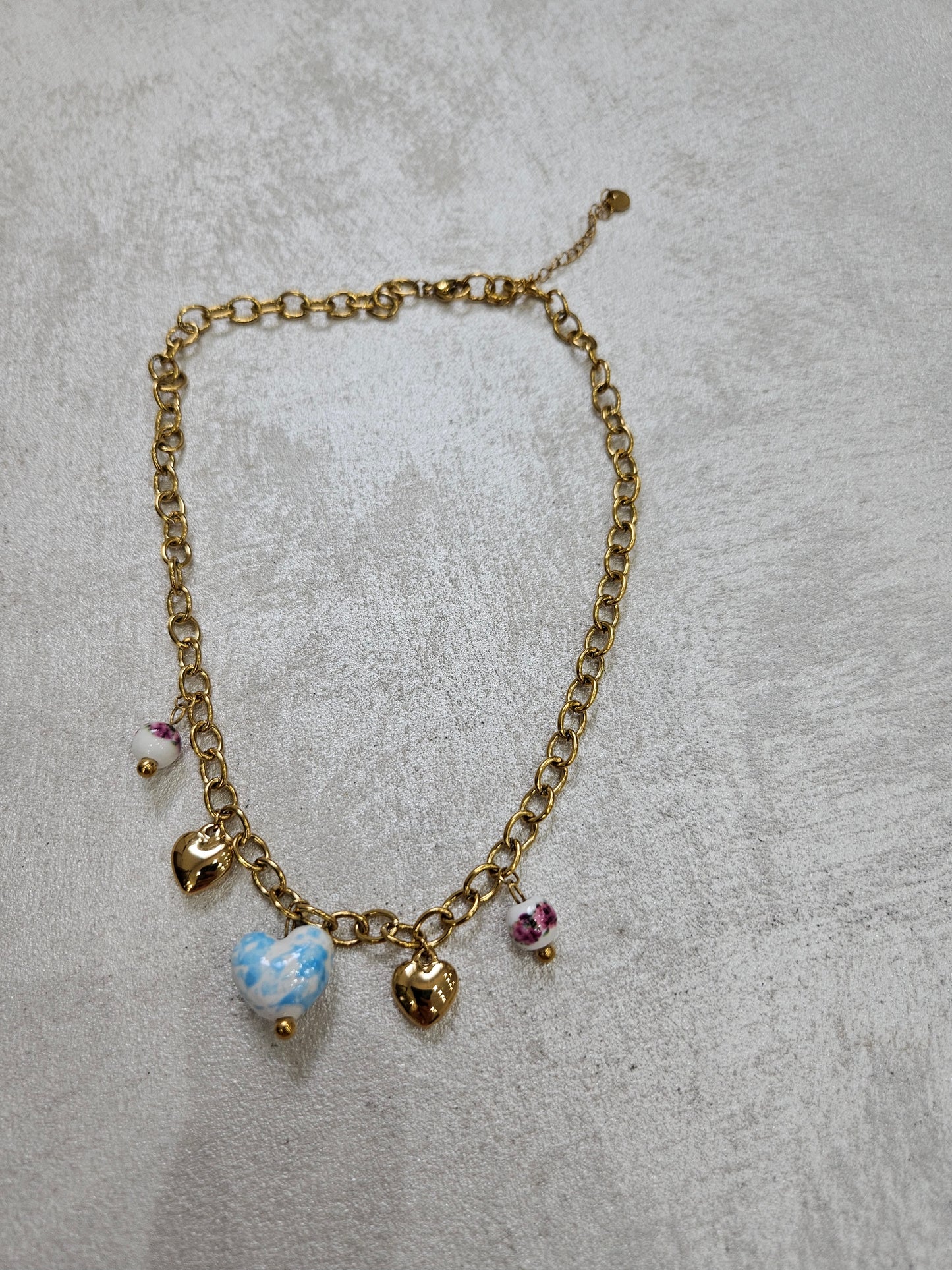 Collana charm con cuori in acciaio inox