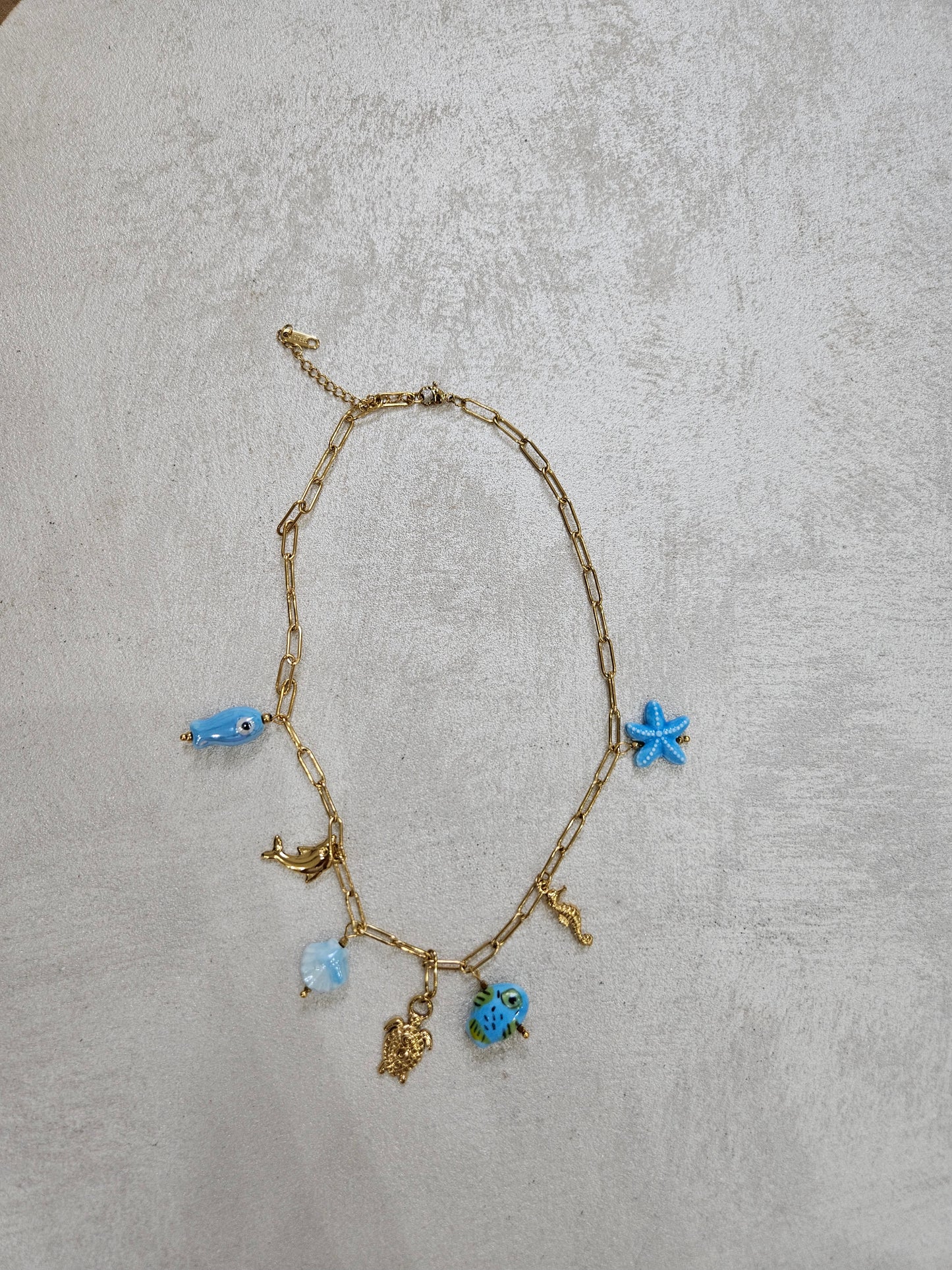 Collana con charm tartaruga in acciaio inox