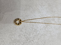 Collana con ciondolo cerchio infinito e zirconi in acciaio inox
