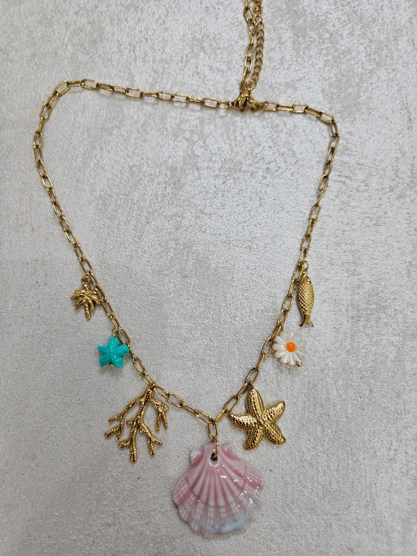 Collana conchiglia e charm in acciaio inox