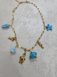 Collana con charm tartaruga in acciaio inox