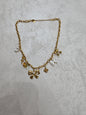 Collana fiocco con charm in acciaio inox