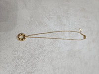 Collana con ciondolo cerchio infinito e zirconi in acciaio inox