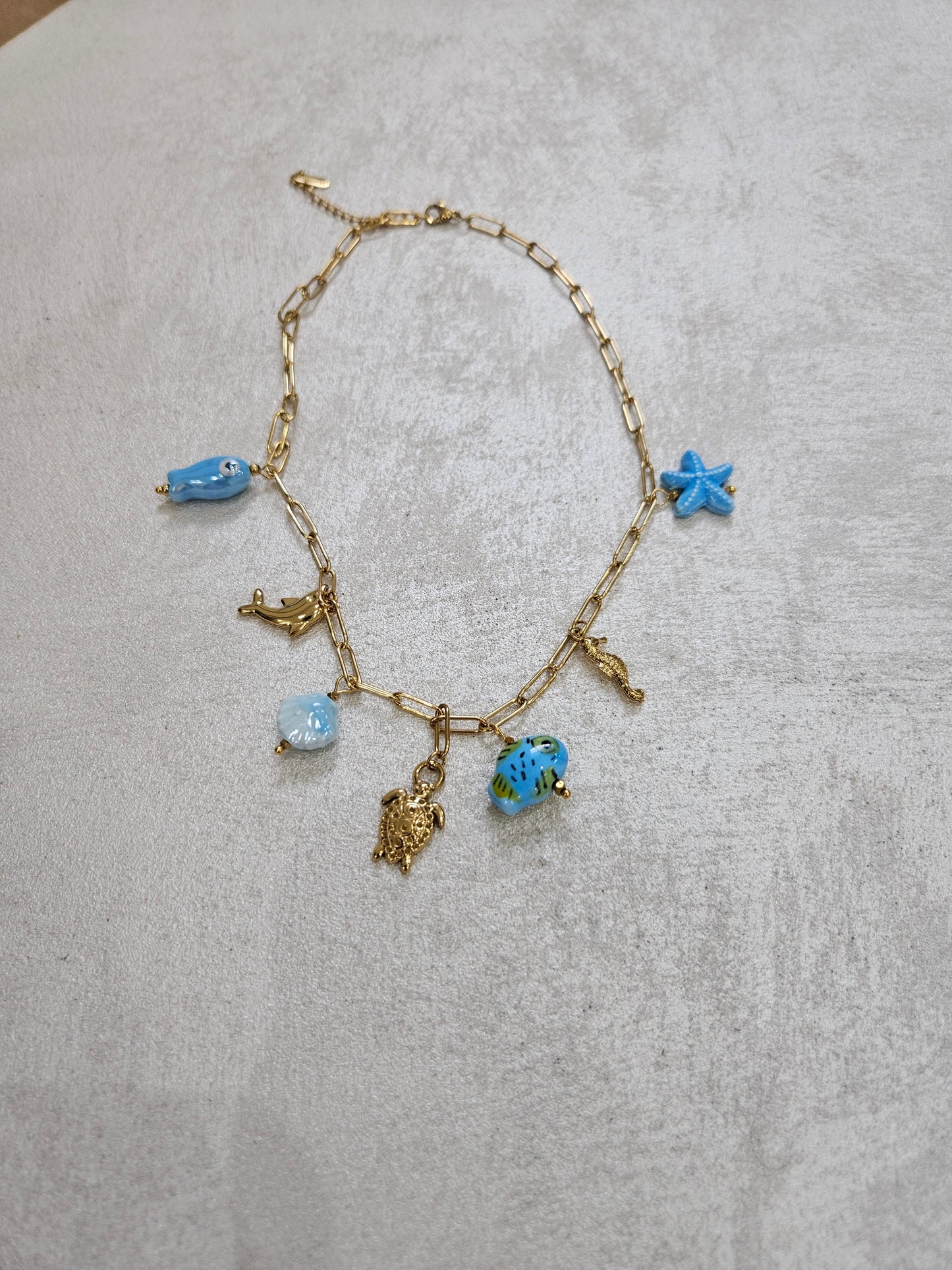 Collana con charm tartaruga in acciaio inox