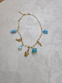 Collana con charm tartaruga in acciaio inox