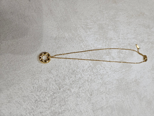 Collana con ciondolo cerchio infinito e zirconi in acciaio inox